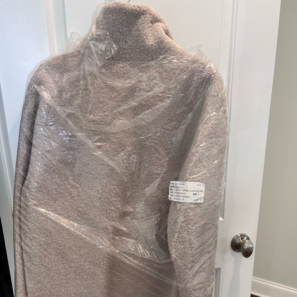 DKNY reversible fuzzy warm and suede coat brand new